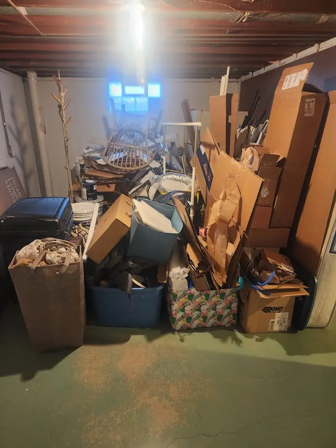 Roll-off dumpster container at job site for Concrete Dumpster Rental in Clifton